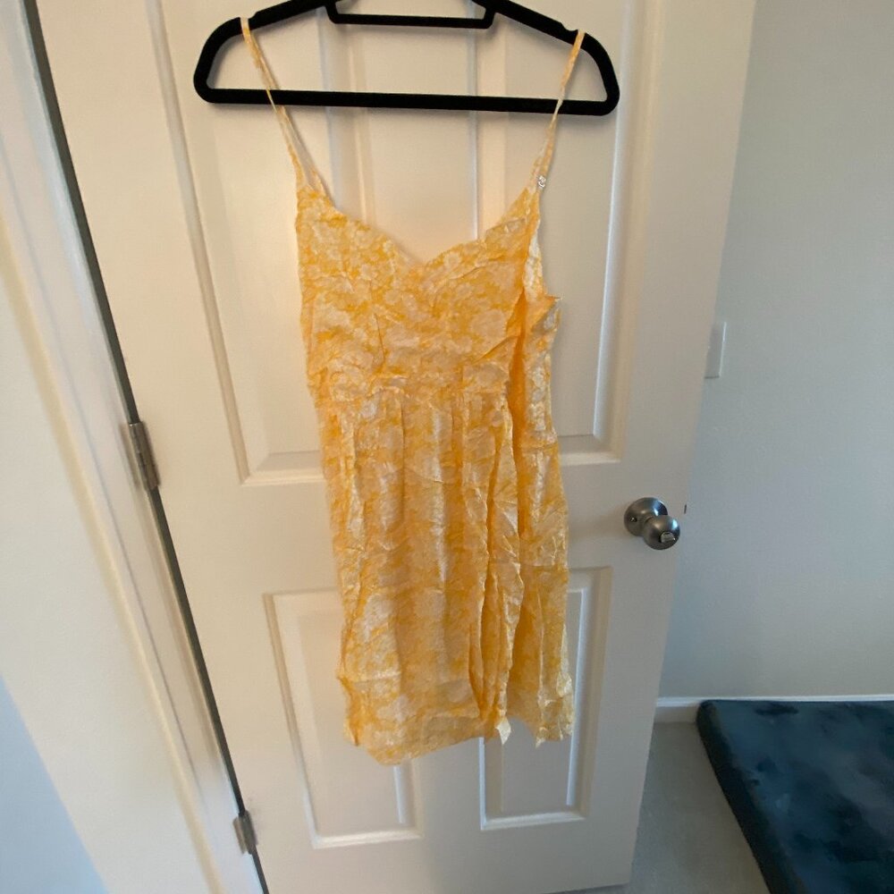 Yellow and white floral day dress